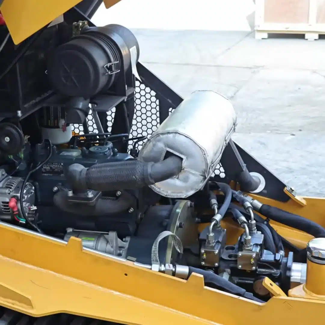 Operator inspecting the internal engine compartment of the XC1100 using the flip open custom seat cushions.